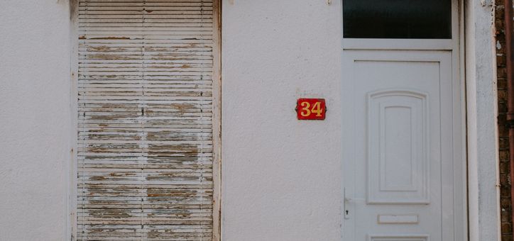 Painted trim, front door, and shutters